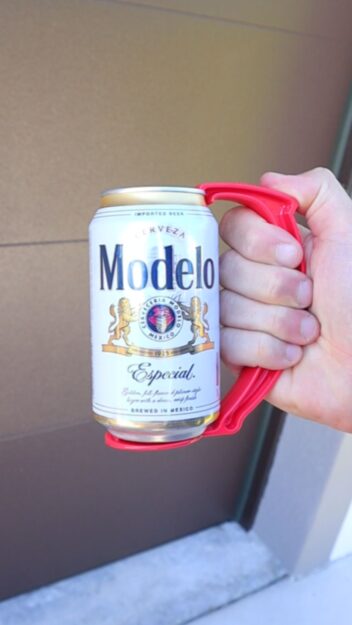 beer can being handled with a beer grip